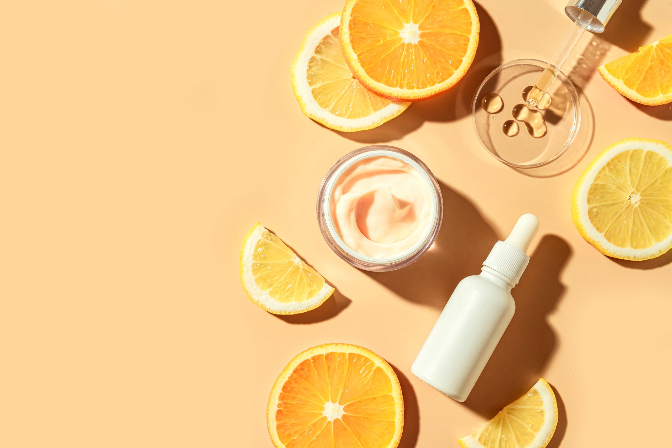 Natural vitamin C serum and face cream, skin care, essential oil products