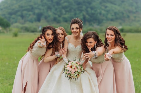 Bridesmaids in field