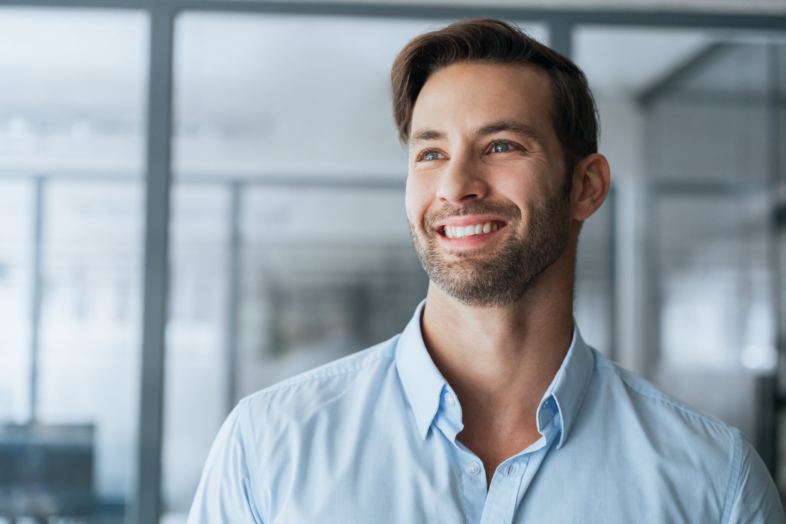 Handsome latin business man employee dreaming aside