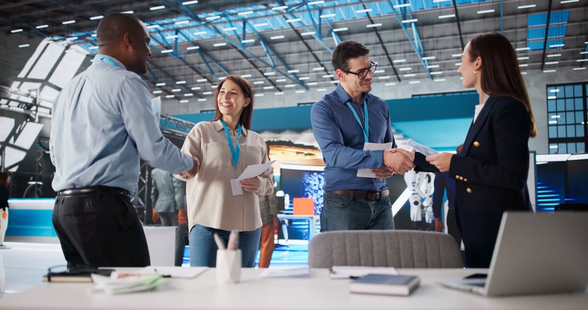 Diverse group of corporate team members at an international business fair