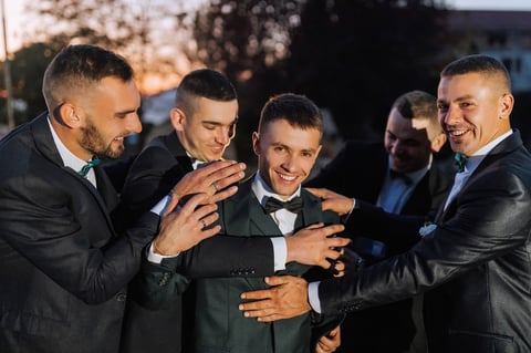 Flash men hugging